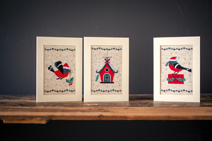Borduurblad productfoto Borduurpakket Vervaco wenskaarten 3 designs ‘Kerstvogeltje en huisje’ 2